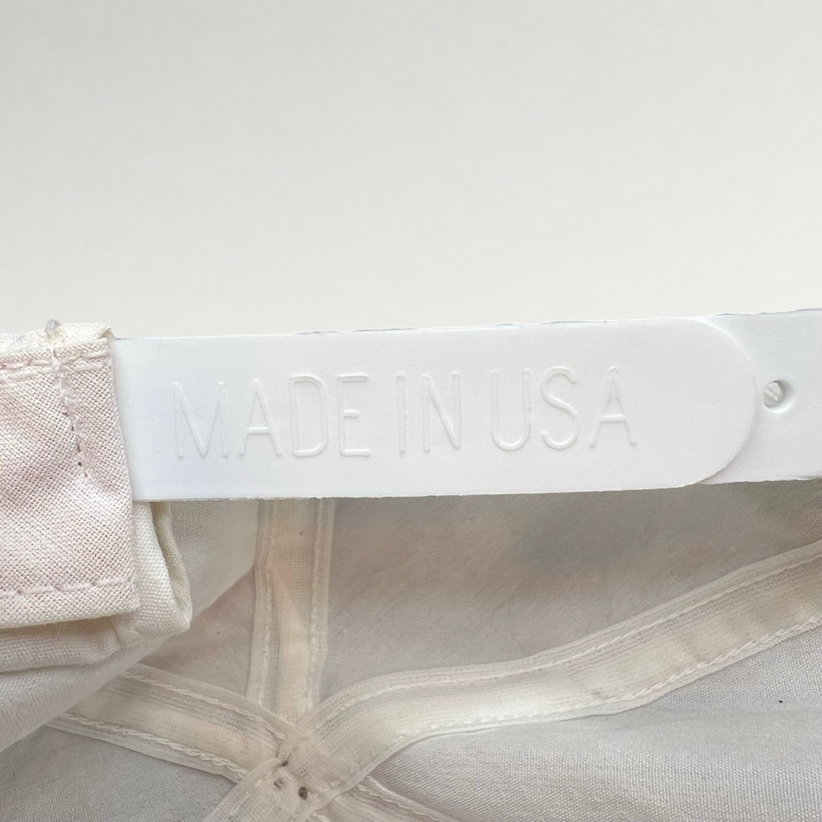 Vintage Hat Source vintage Pepsi hat featuring a white plastic snapback strap embossed with Made in USA text