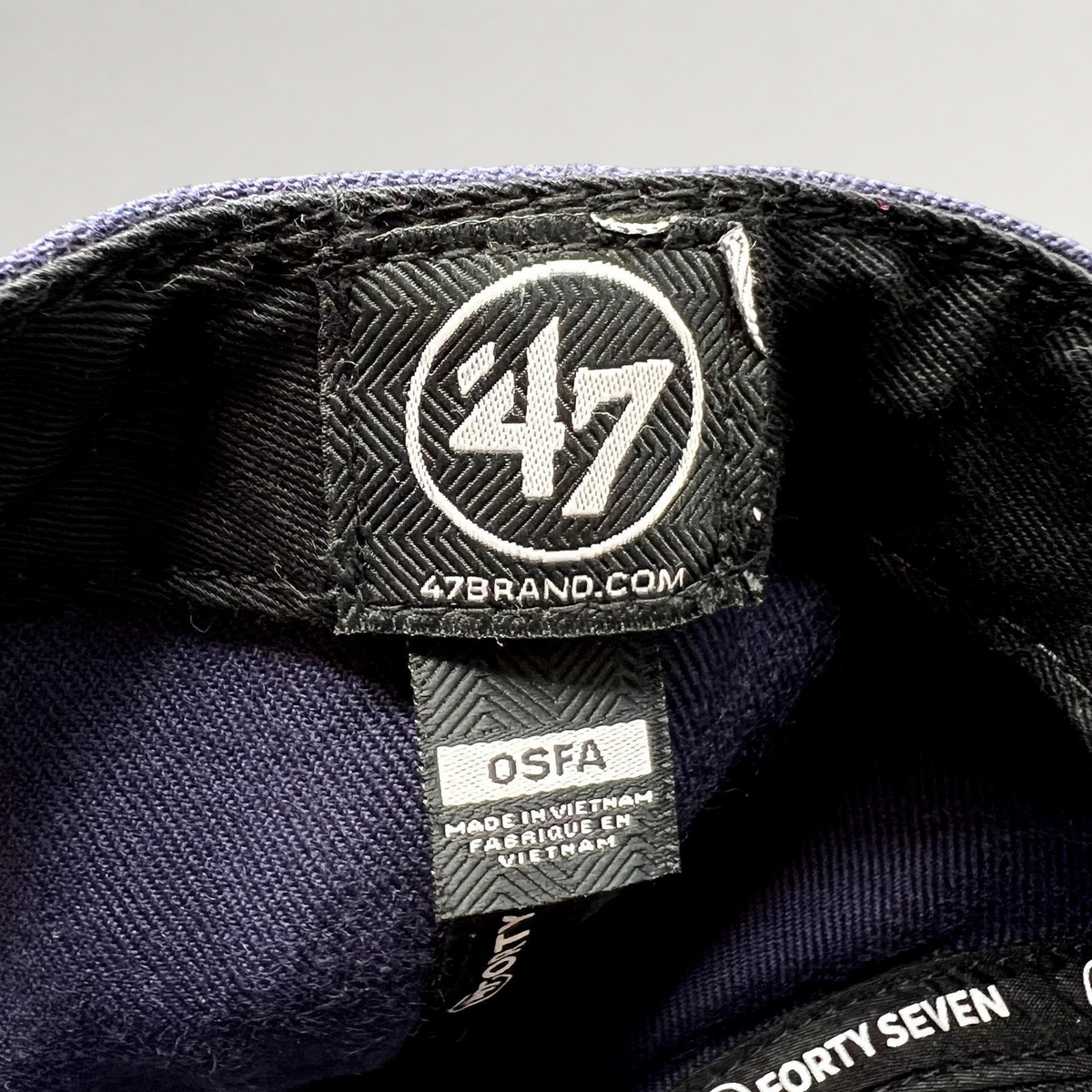 Raree Finds ’47 Brand interior hat label showing the logo and OSFA size tag on a navy blue cotton snapback cap