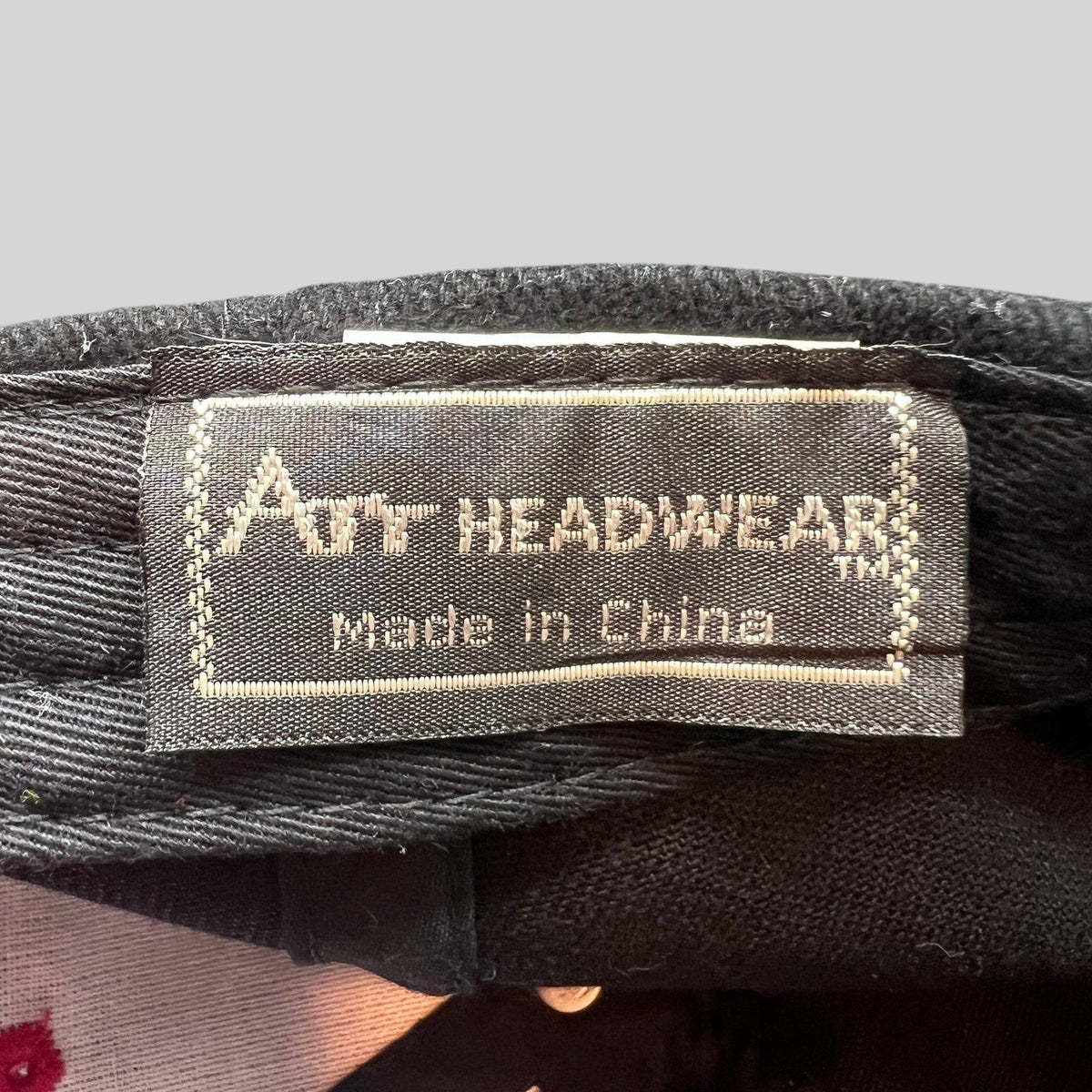 Raree Finds vintage Amy Headwear label inside a black cotton blend snapback cap