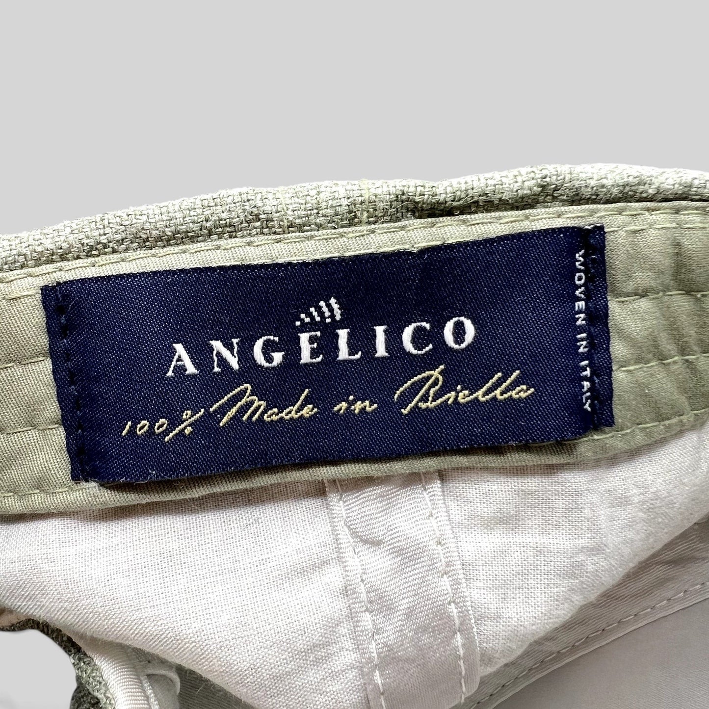 Raree Finds Angelico sage green linen cap interior label showing 100% Made in Biella Italian craftsmanship