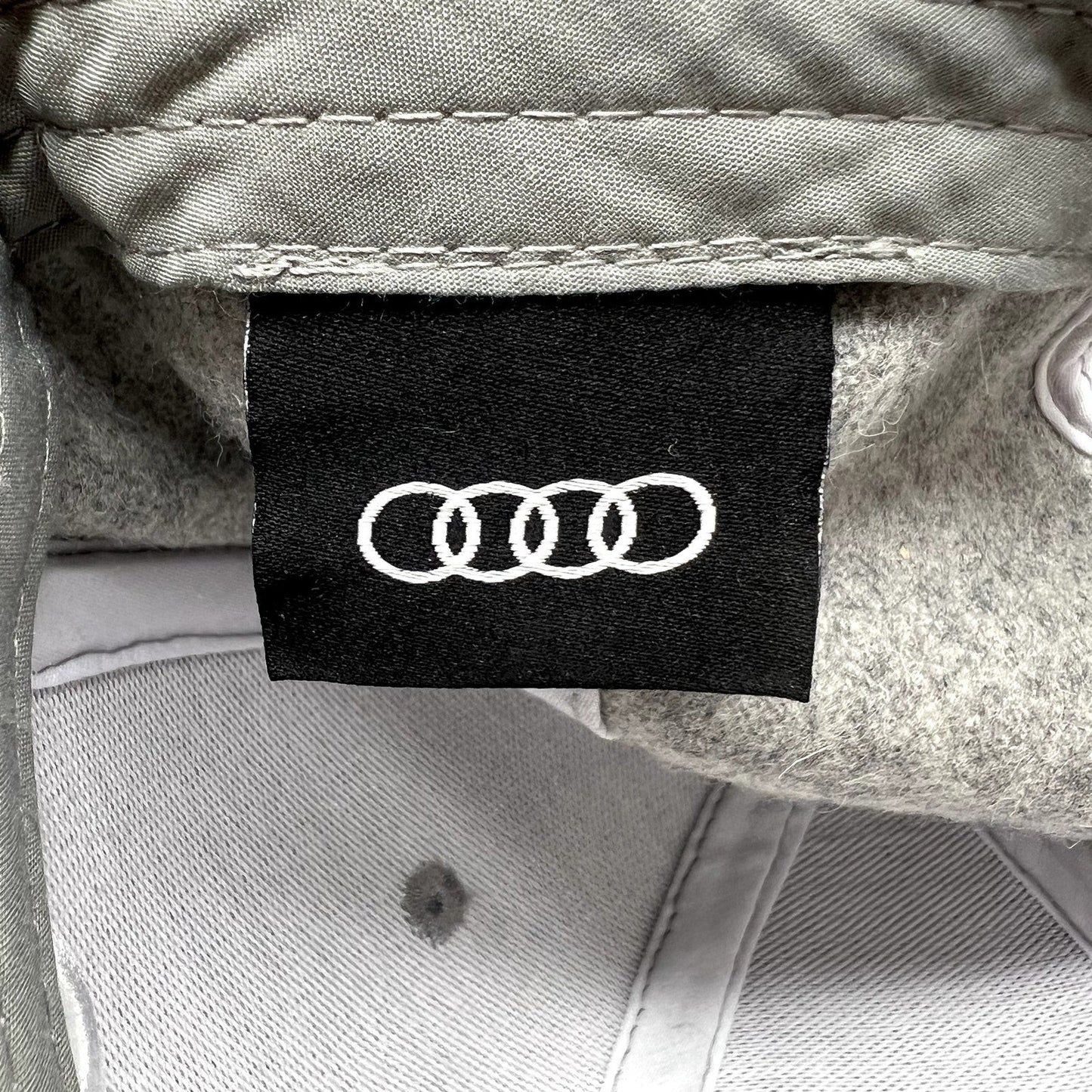 Raree Finds Audi FIS Alpine World Cup hat interior featuring a black fabric label with white embroidered Audi rings