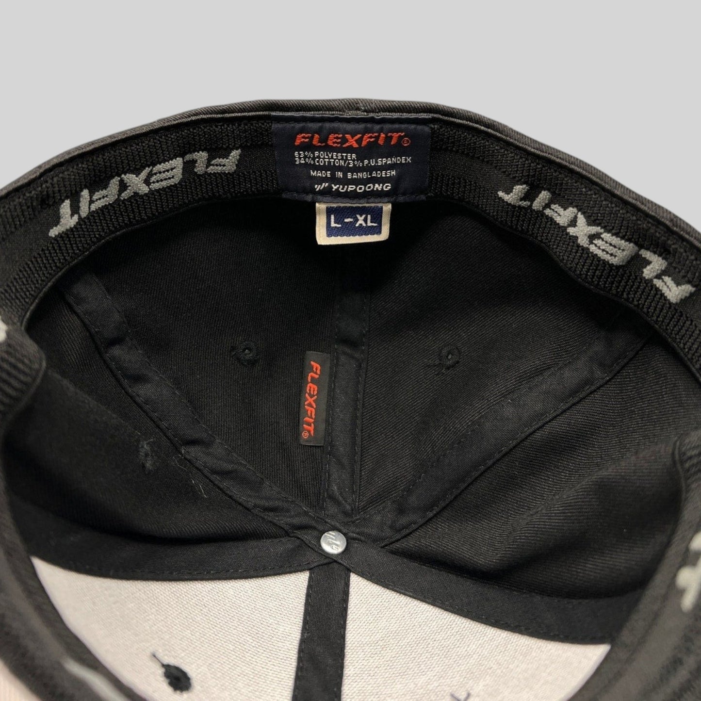 Raree Finds Avengers Endgame cast and crew Flexfit hat interior showing official Marvel Studios branding and size tag