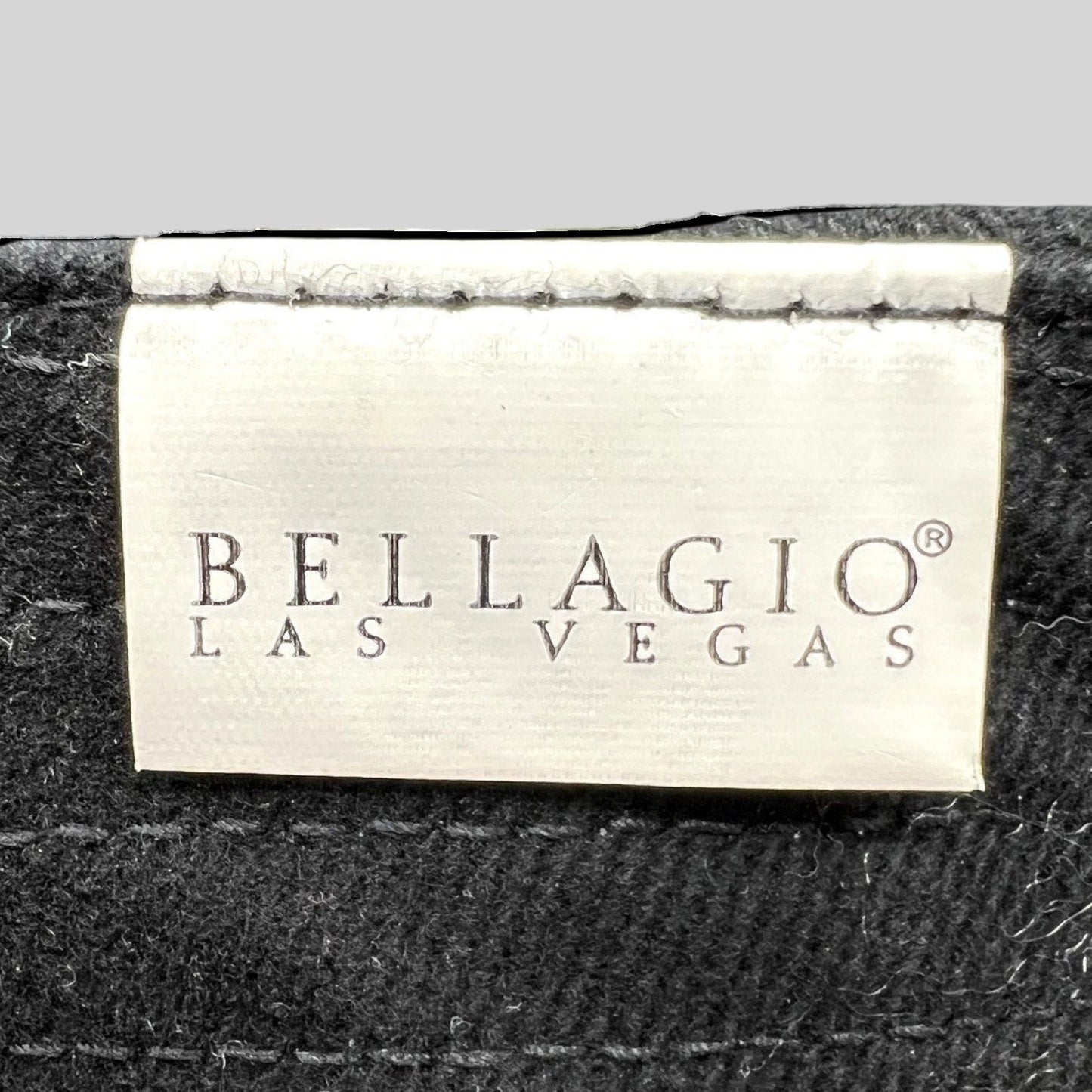Raree Finds Bellagio Las Vegas branded silver metal clasp on a black strapback hat