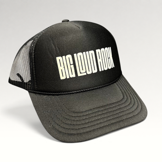 Raree Finds black and white Big Loud Rock trucker hat with foam front, mesh back, and adjustable snapback closure.