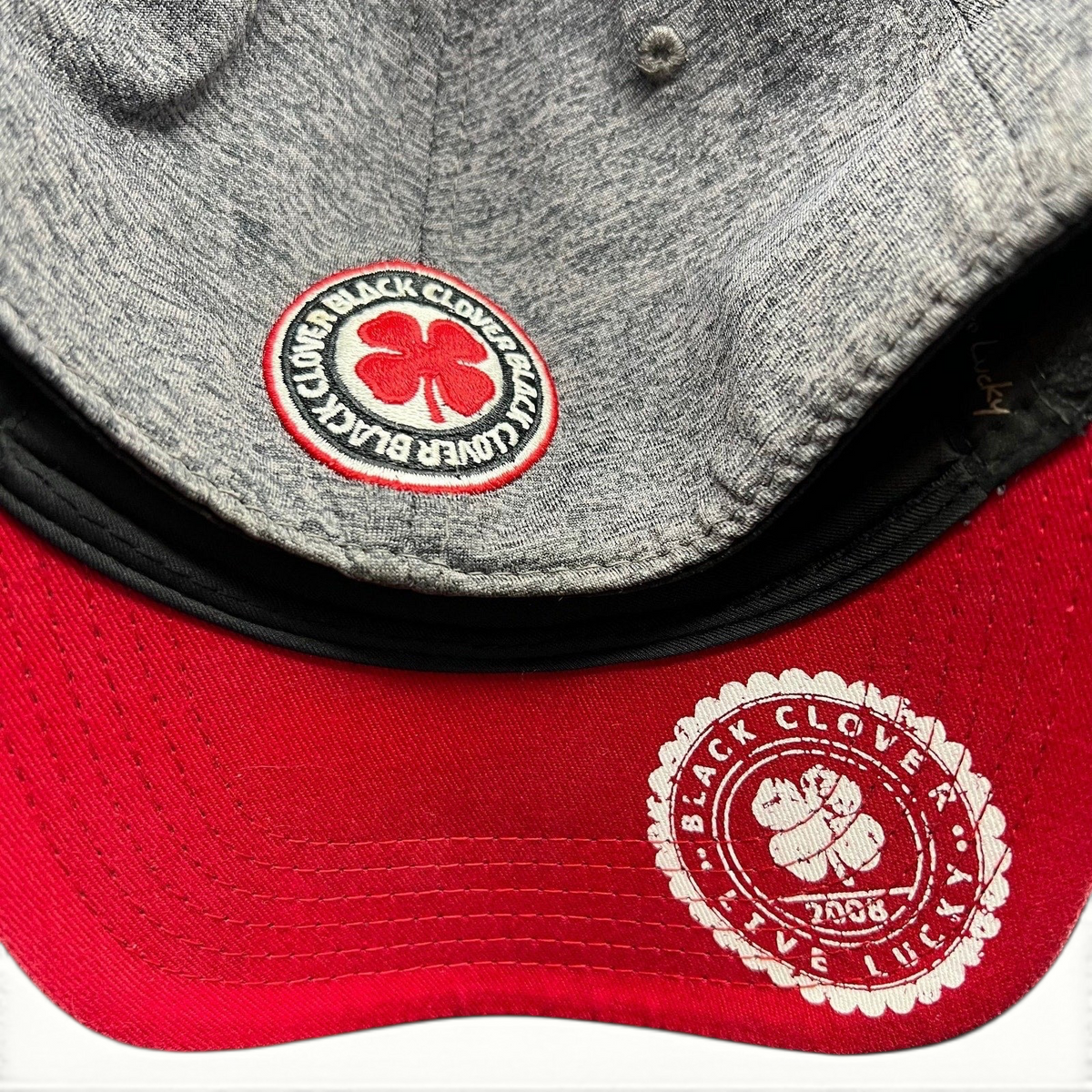 Raree Finds Black Clover heather gray performance cap with red undervisor and California bear clover logo detail