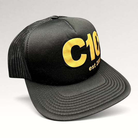 Raree Finds black and gold C10 trucker snapback hat with a structured foam front and breathable mesh back panels.