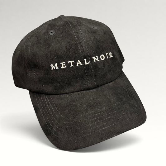 Raree Finds black unstructured strapback hat with white Metal Noir embroidery and a soft suede-like finish