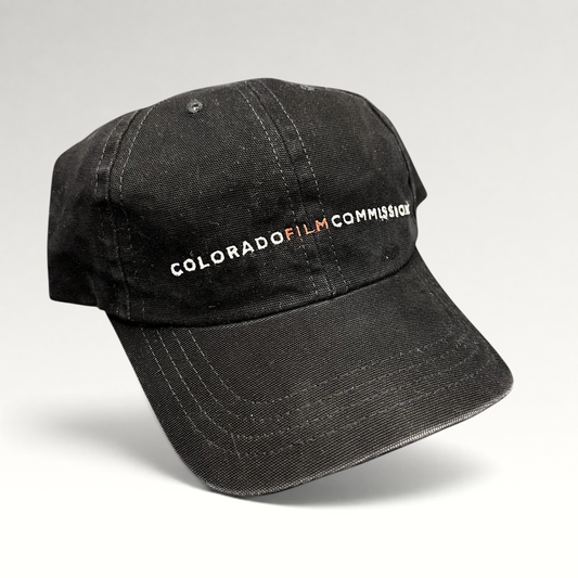 Raree Finds black Colorado Film Commission cotton strapback hat with white and red embroidered logo on front