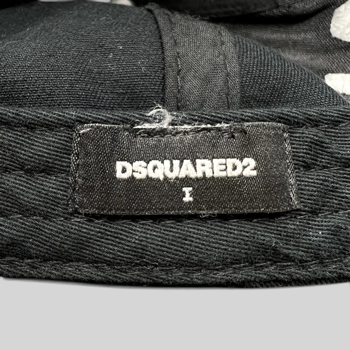 Raree Finds DSQUARED2 black baseball cap interior brand label with white embroidered logo text
