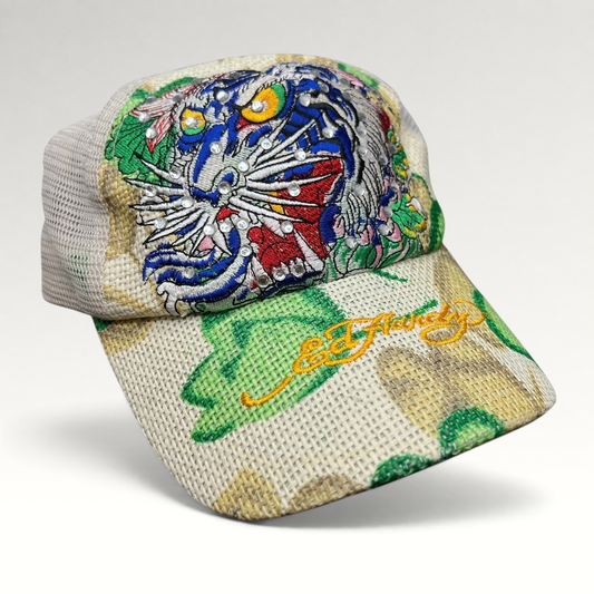 Raree Finds vintage Ed Hardy trucker hat with tiger embroidery, rhinestone accents, and a natural canvas mesh design.