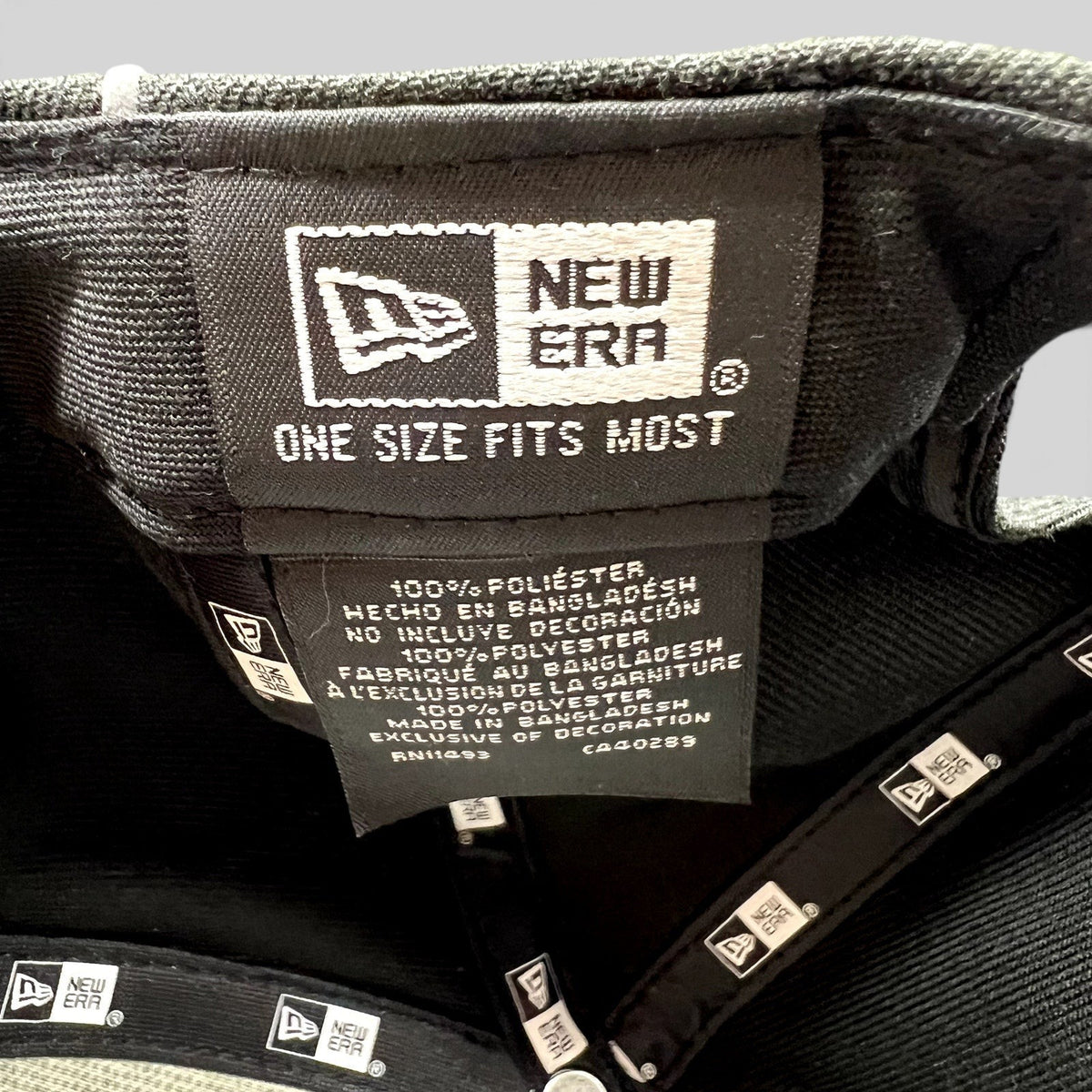 Raree Finds Fox Racing New Era hat interior label showing 100 percent polyester material and one size fits most
