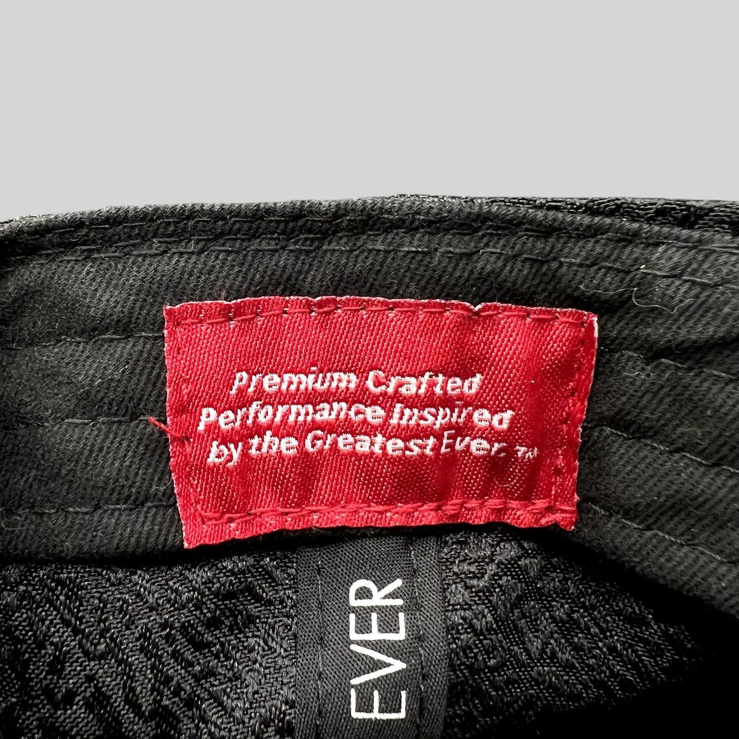 Raree Finds Jordan snapback interior red woven label with white text Premium Crafted Performance Inspired by the Greatest