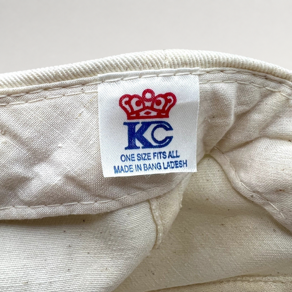 Raree Finds vintage KC brand snapback hat interior label with crown logo and size information