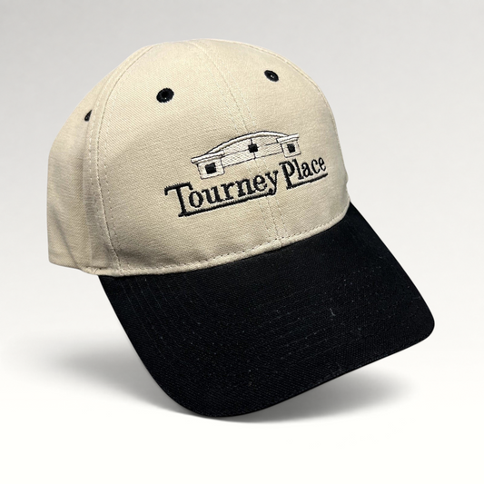 Raree Finds two-tone khaki and black cotton dad hat with embroidered Tourney Place clubhouse logo and curved brim.