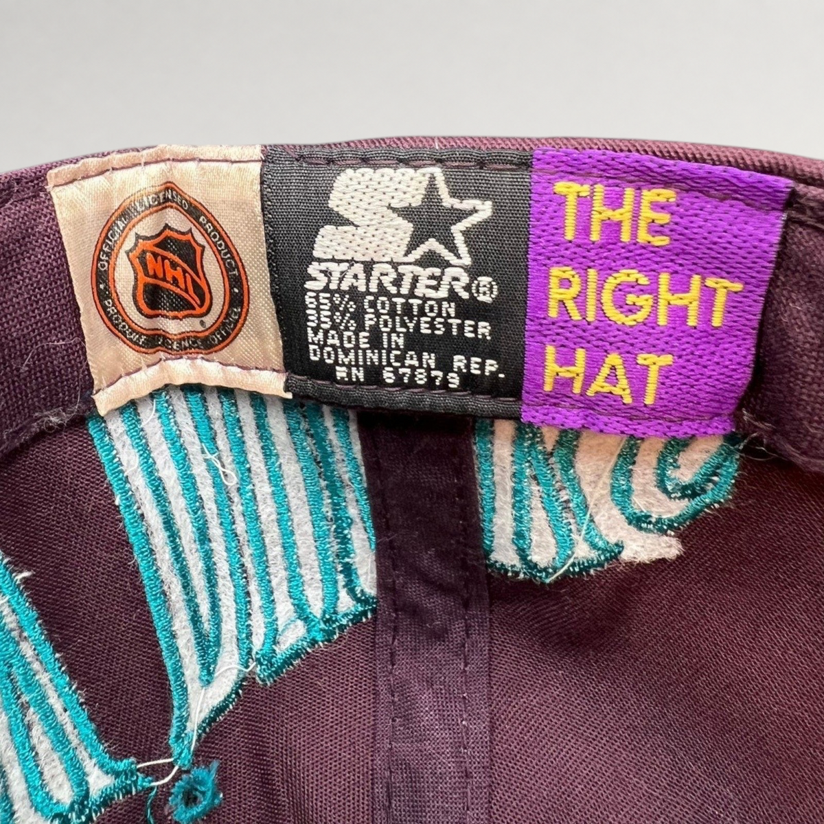 Raree Finds vintage 90s Starter Mighty Ducks snapback interior tag with NHL logo and The Right Hat branding