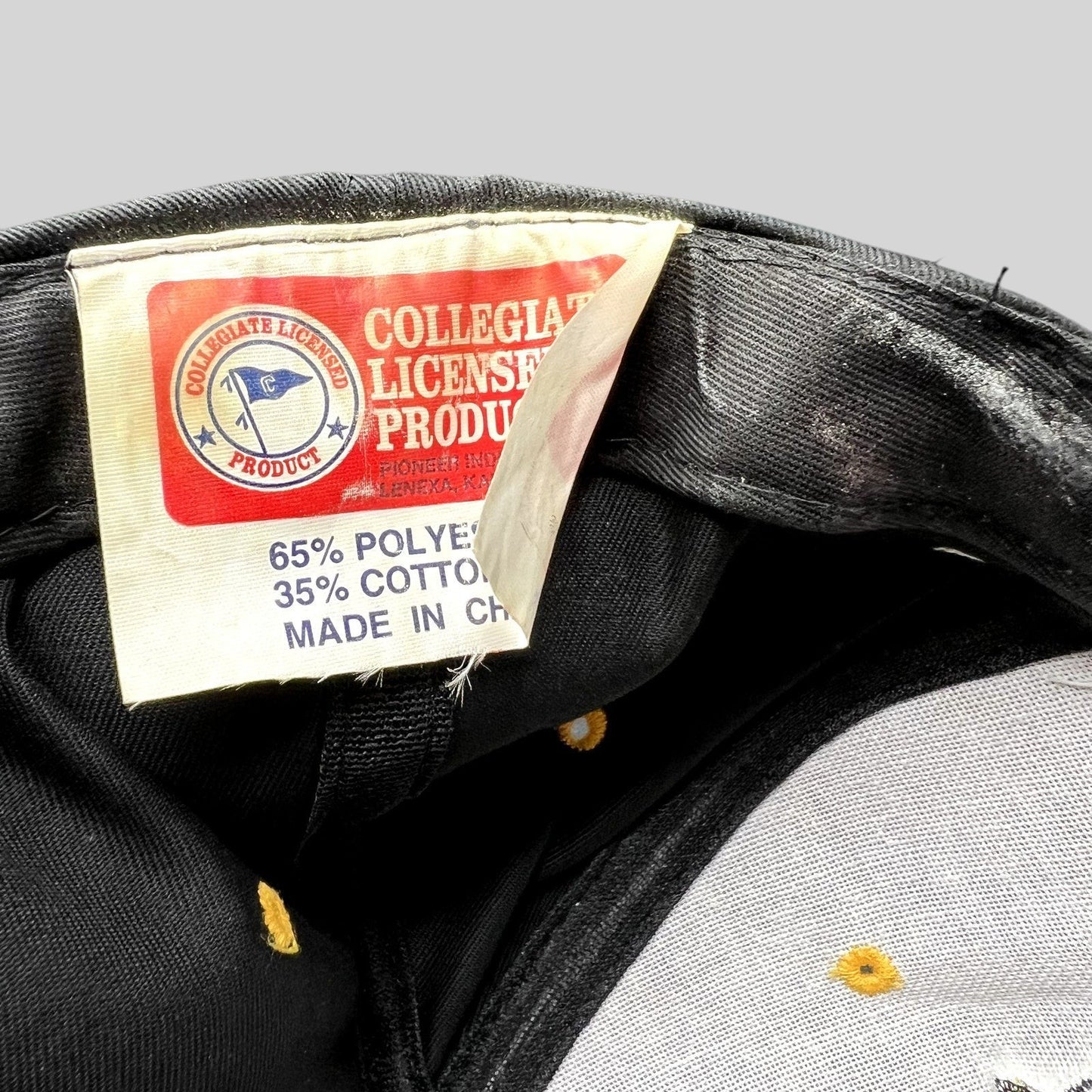 Raree Finds vintage University of Missouri Mizzou snapback hat interior tag showing collegiate licensing details
