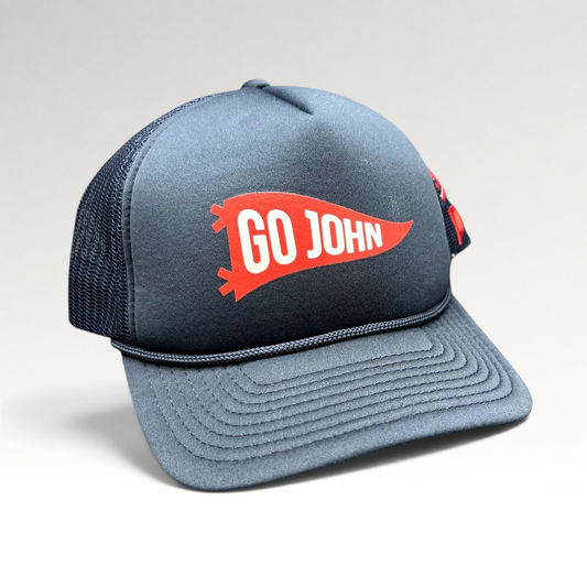 Raree Finds navy blue vintage trucker hat with red GO JOHN pennant graphic, braided rope, and mesh back panels.