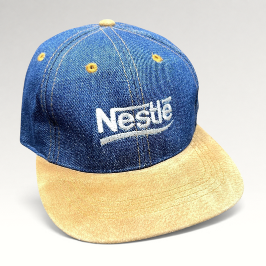 Raree Finds vintage Nestlé promotional hat with indigo denim crown, tan suede brim, and adjustable leather strapback.