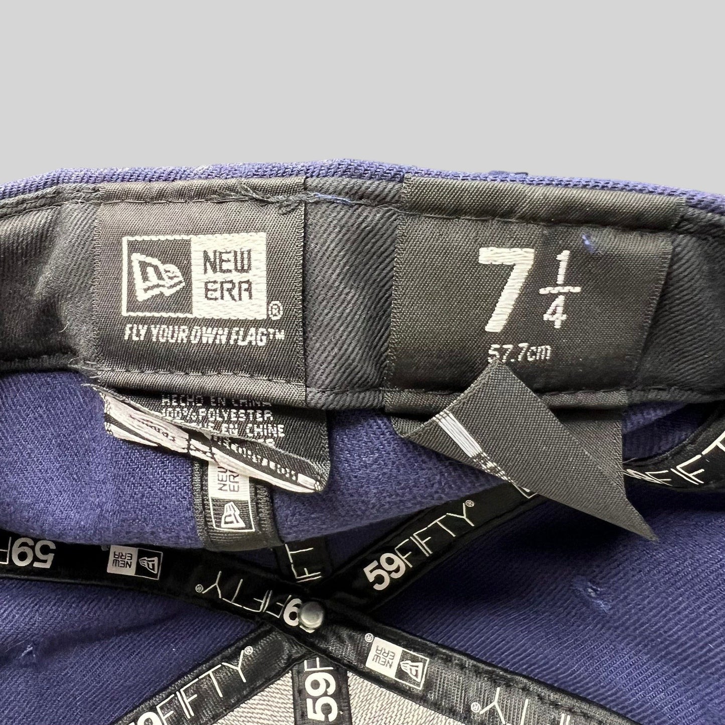 Raree Finds New Era 59FIFTY navy fitted hat interior label showing size 7 1/4 and authentic branding details
