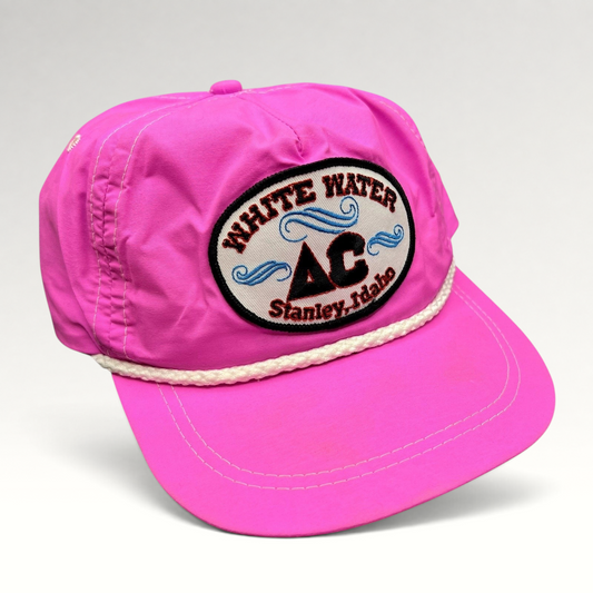 Raree Finds vintage neon pink nylon Imperial strapback hat with White Water AC Stanley Idaho patch and white rope trim.