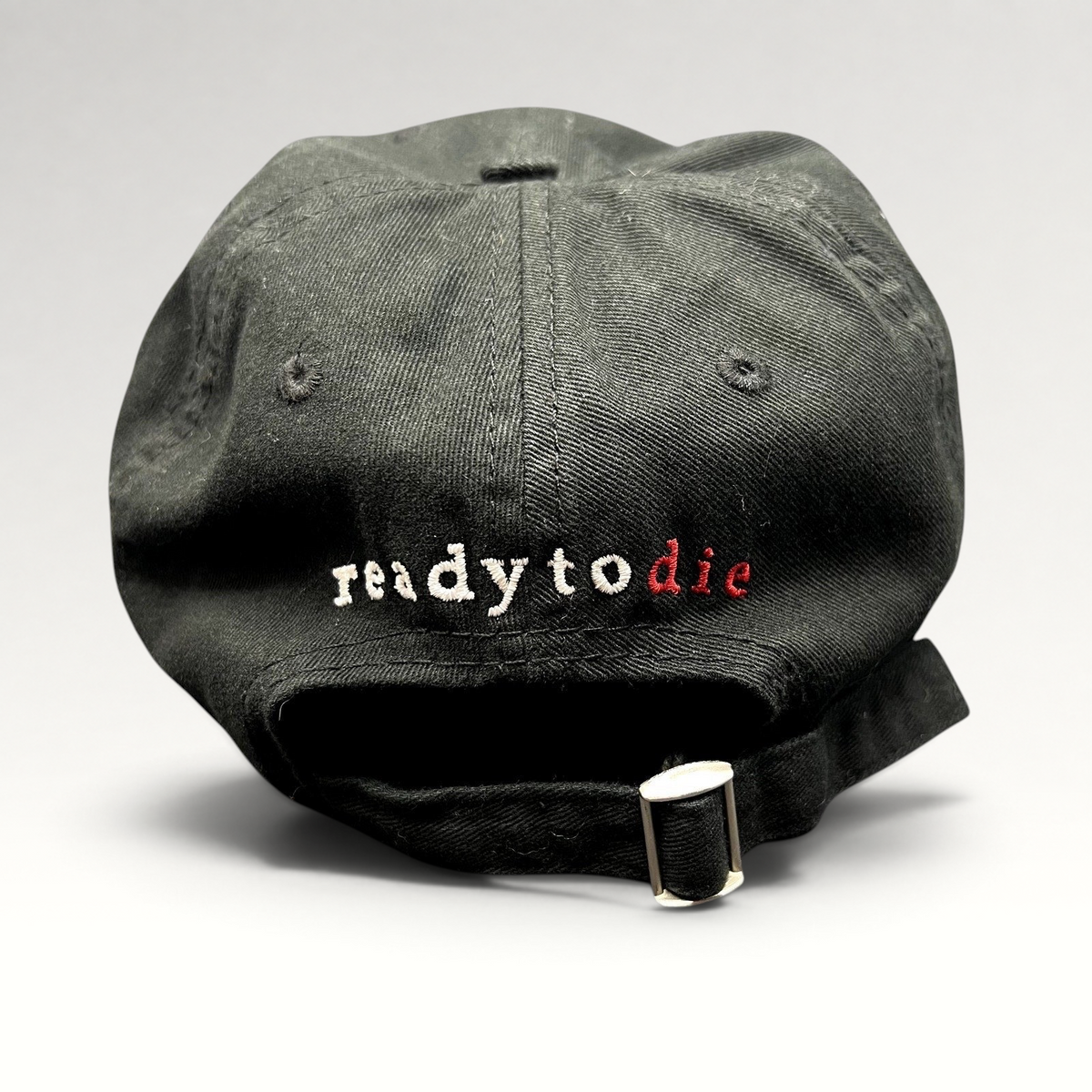 Raree Finds black strapback hat featuring Ready To Die embroidered in white and red on the back with metal closure.