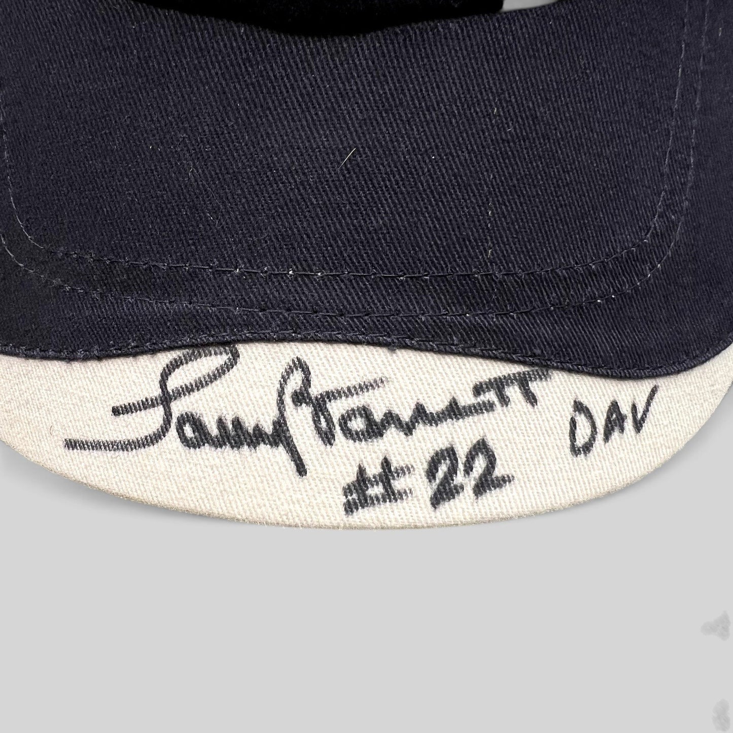 Raree Finds Cap America navy and cream strapback hat with a signed brim reading #22 DAV
