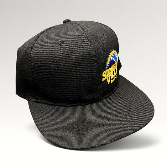 Raree Finds black snapback hat featuring an embroidered Sunshine Village Banff Canada mountain logo on a flat brim