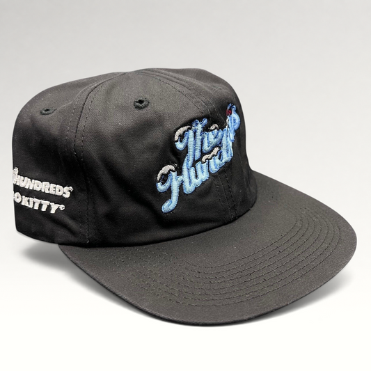 Raree Finds The Hundreds x Hello Kitty black cotton snapback hat with blue embroidered script and curved brim