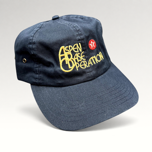 Raree Finds vintage navy blue cotton strapback hat with gold Aspen Base Operation embroidery and red ski resort logo