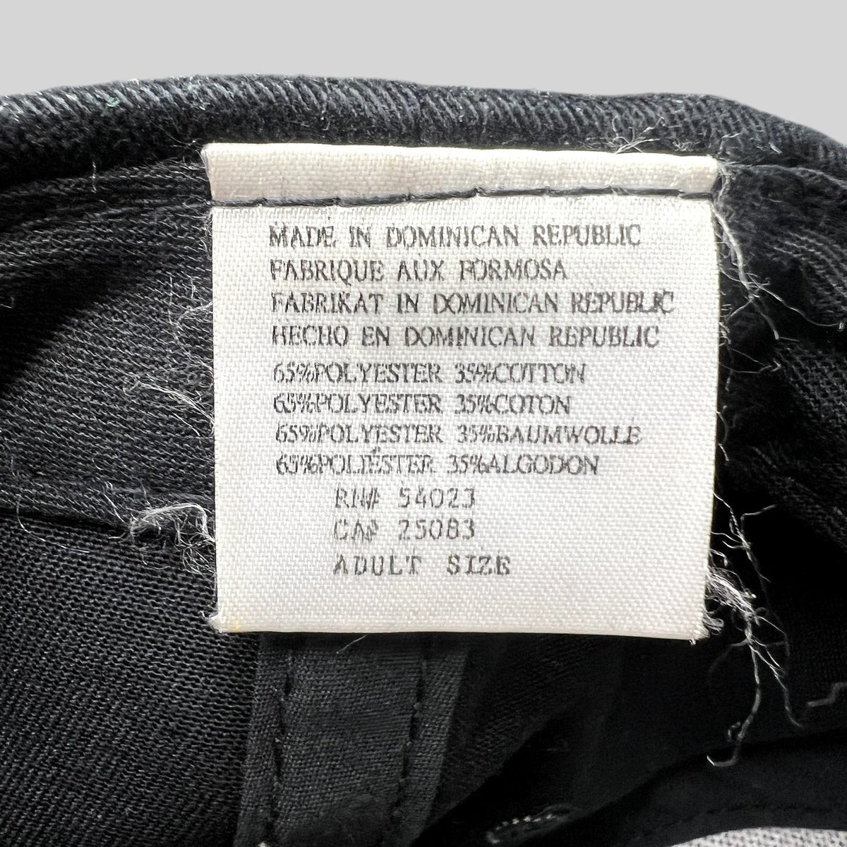 Raree Finds vintage 90s Disney Store Mickey Mouse hat interior fabric care tag showing material composition