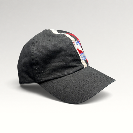 Raree Finds vintage IZOD IndyCar Series black cotton strapback cap with racing stripe embroidery and logo detail.