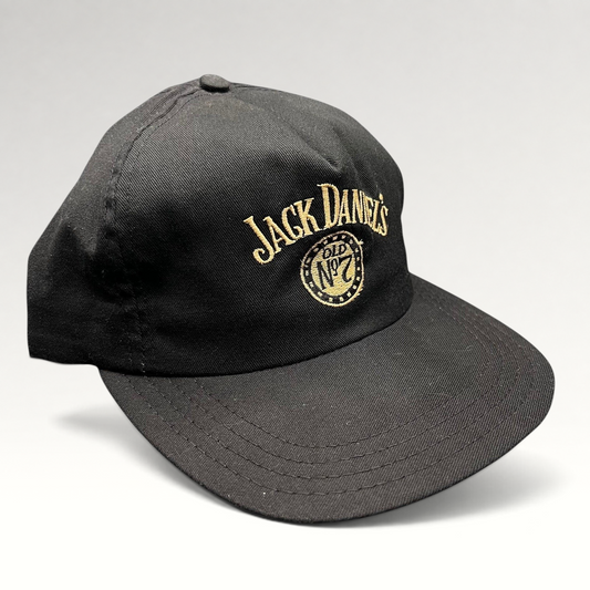 Raree Finds vintage 90s Jack Daniel’s black snapback hat with gold embroidered Old No. 7 logo and arched script