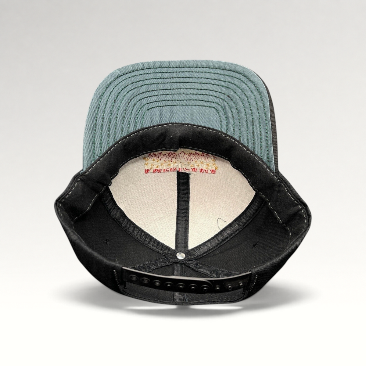 Raree Finds vintage Americana Fireworks snapback hat interior showing green undervisor and adjustable plastic strap