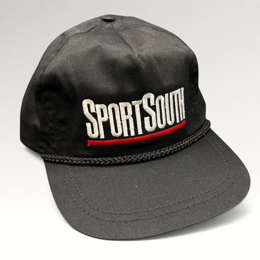 Raree Finds vintage black SportSouth rope strapback hat with white and red embroidery and a classic green underbrim.