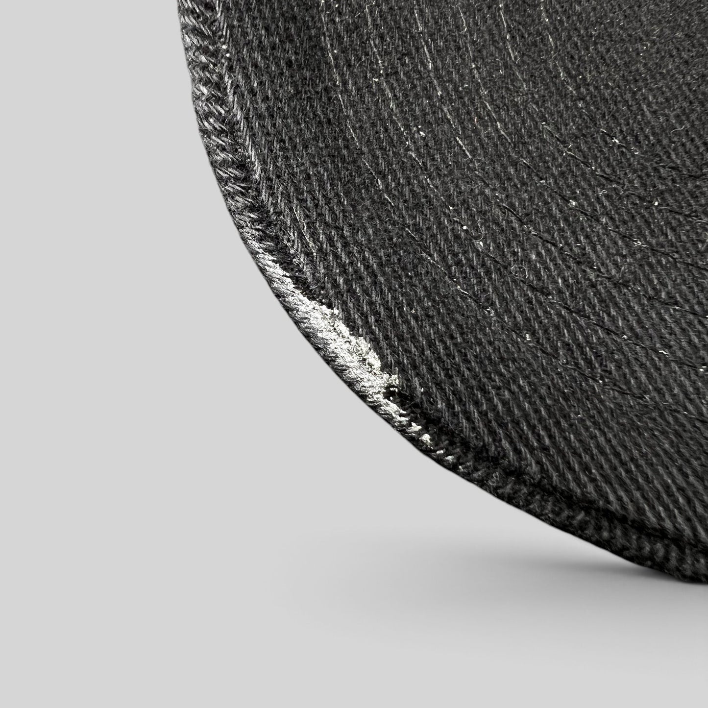 Raree Finds vintage 1990s black Timberline strapback hat brim detail showing worn texture