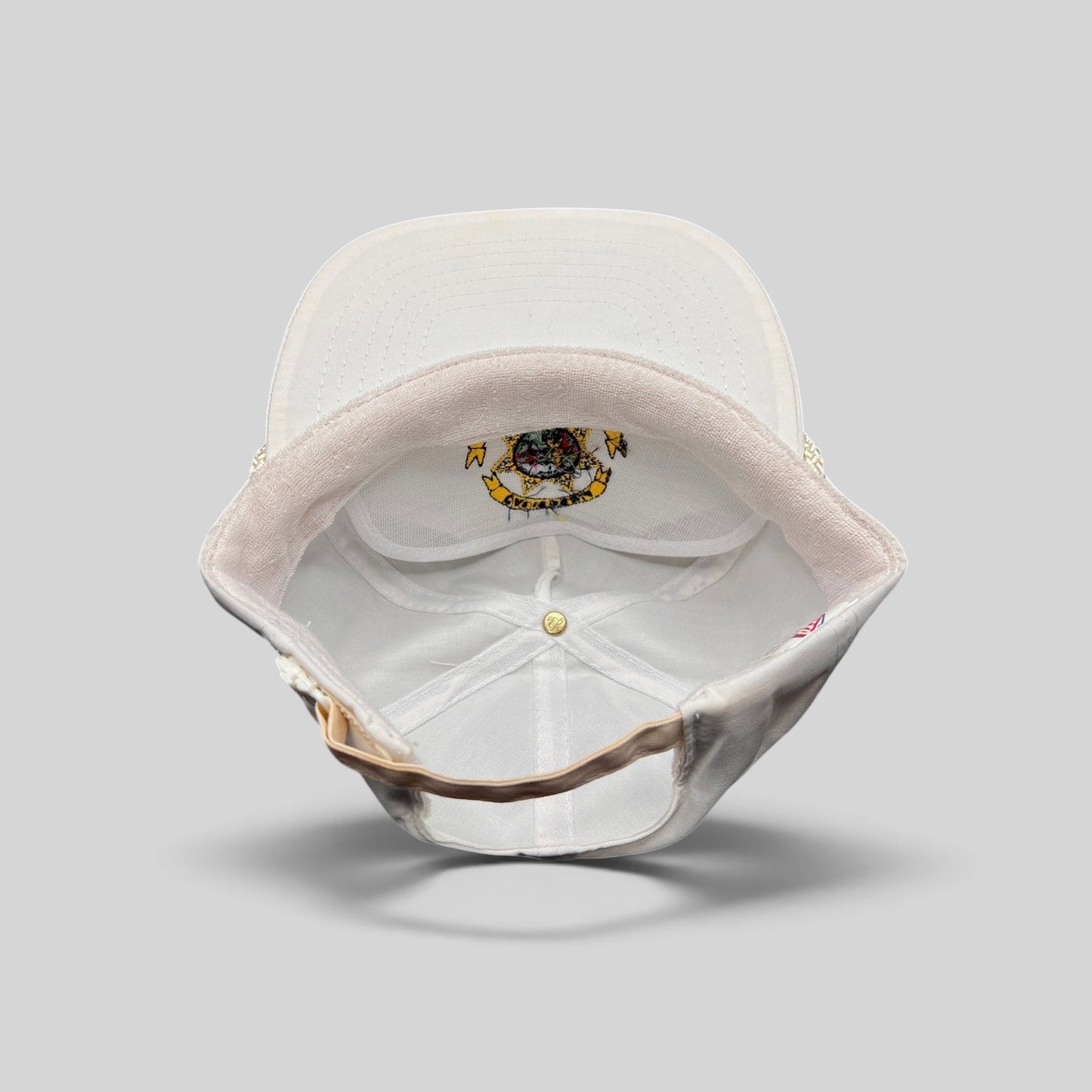 Raree Finds vintage white Otto snapback hat with California State Parole emblem and braided rope detail, interior view