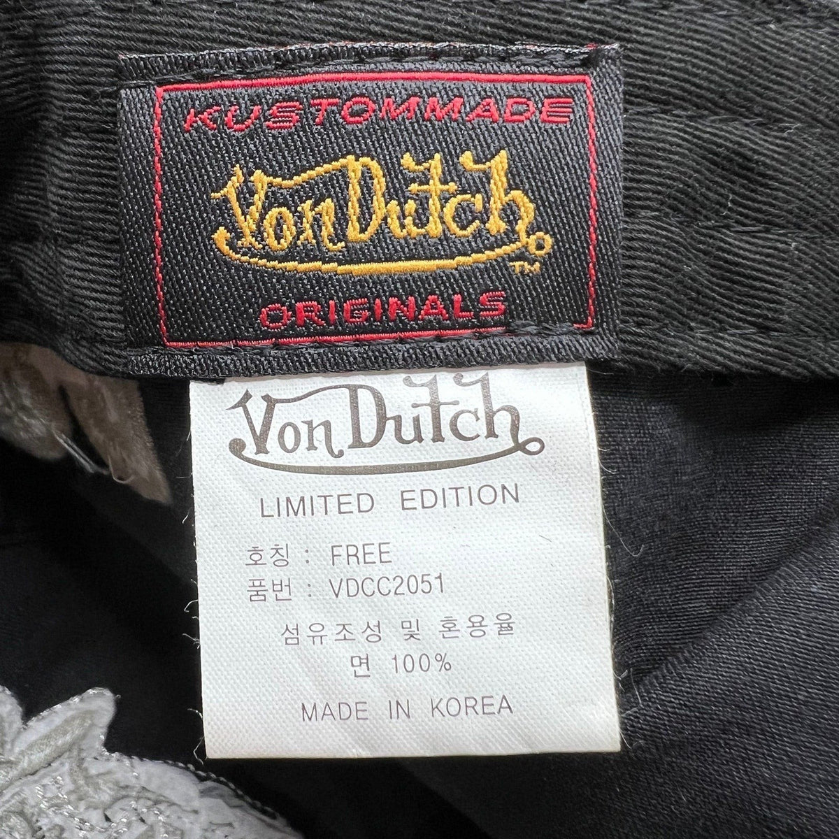 Raree Finds Von Dutch Limited Edition hat interior label showing 100% cotton construction and Made in Korea tag.