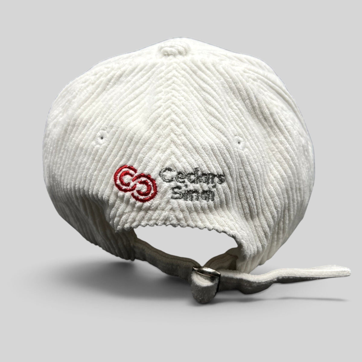 Raree Finds white corduroy Los Angeles Clippers strapback hat featuring an embroidered Cedars-Sinai logo on the back.