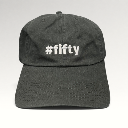 Raree Finds black cotton strapback hat with white #fifty embroidery, commemorating the Aspen 2017 anniversary.