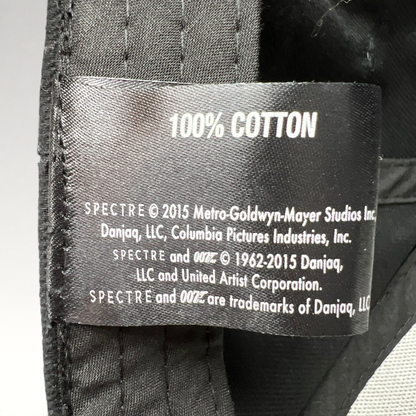 Raree Finds 2015 Spectre 007 promotional hat interior tag showing 100% cotton and official MGM Danjaq licensing info