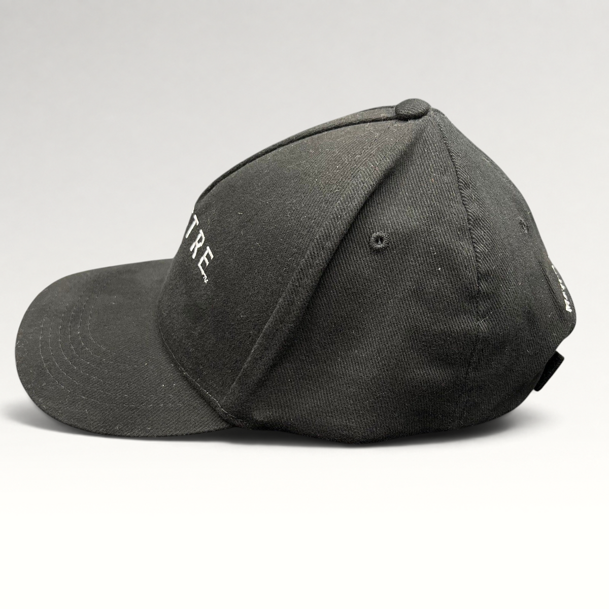 Raree Finds black cotton Spectre 007 promotional strapback hat with white embroidered James Bond film branding