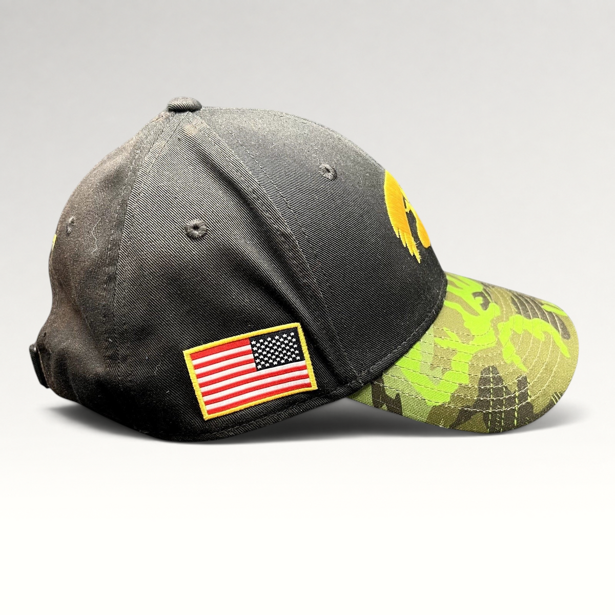 Raree Finds Nike Iowa Hawkeyes Legacy91 strapback hat with black crown, green camo visor, and American flag patch.