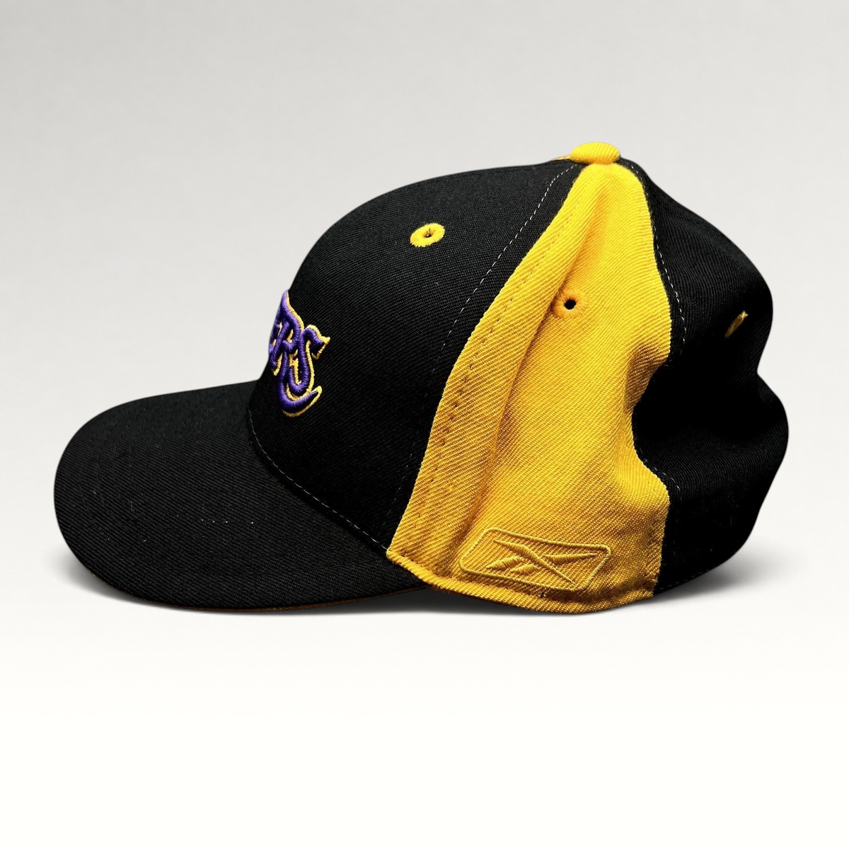 Raree Finds vintage Reebok Los Angeles Lakers fitted hat in black and gold with purple embroidered logo