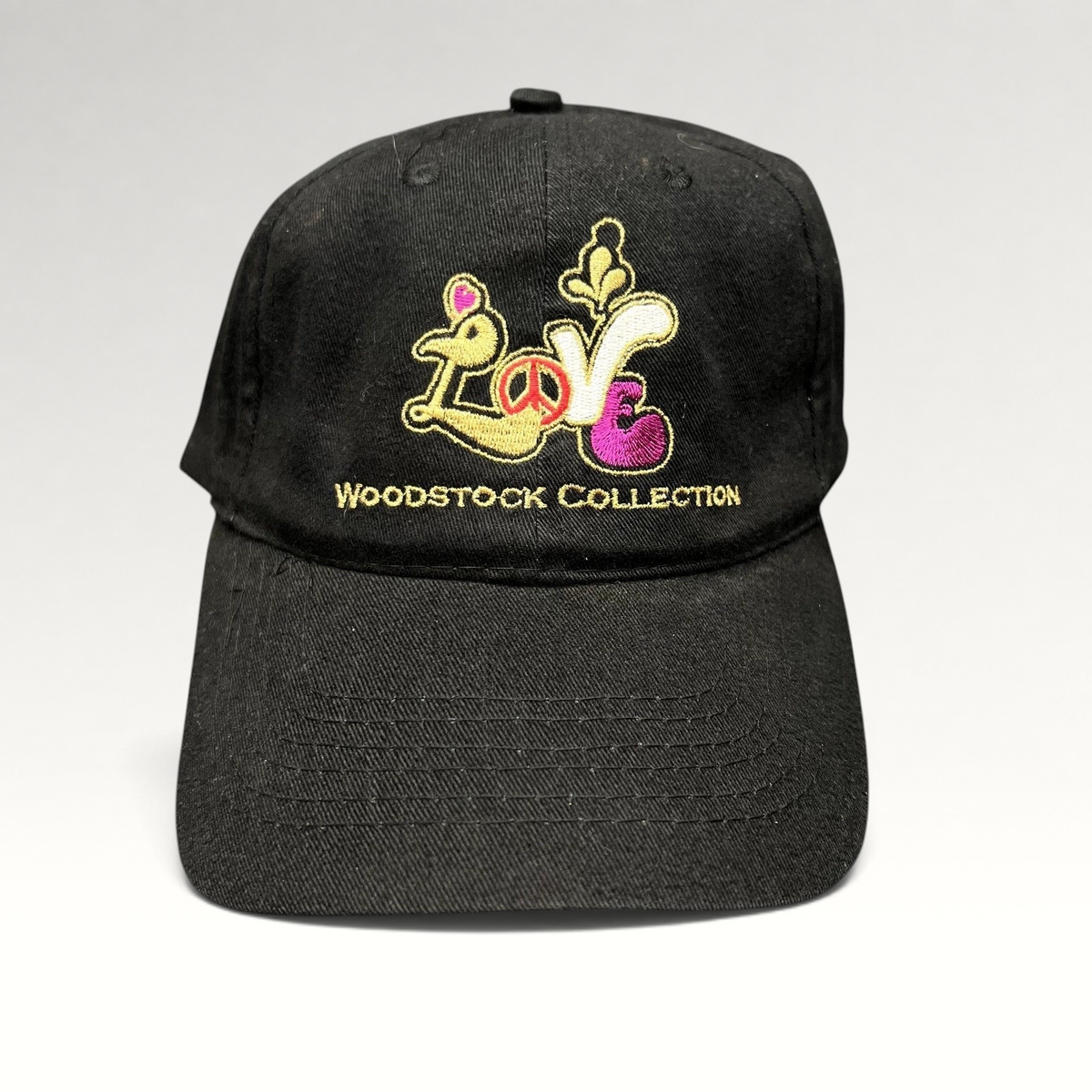 Raree Finds black cotton strapback hat with colorful embroidered Woodstock Collection Love logo and peace sign design