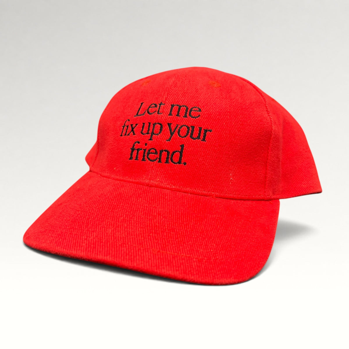 Red Honda slogan strapback hat, front left angle
