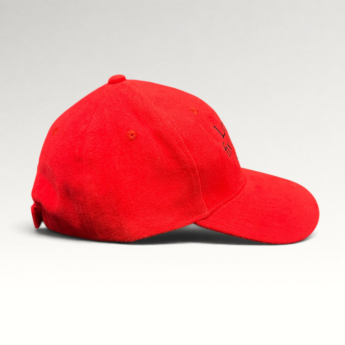 Red Honda slogan strapback hat, right side
