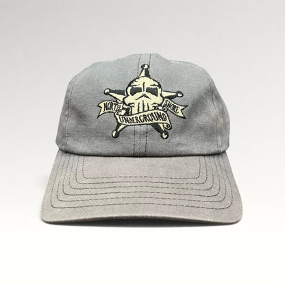 Front view of gray North Shore Underground 1990s snapback hat
