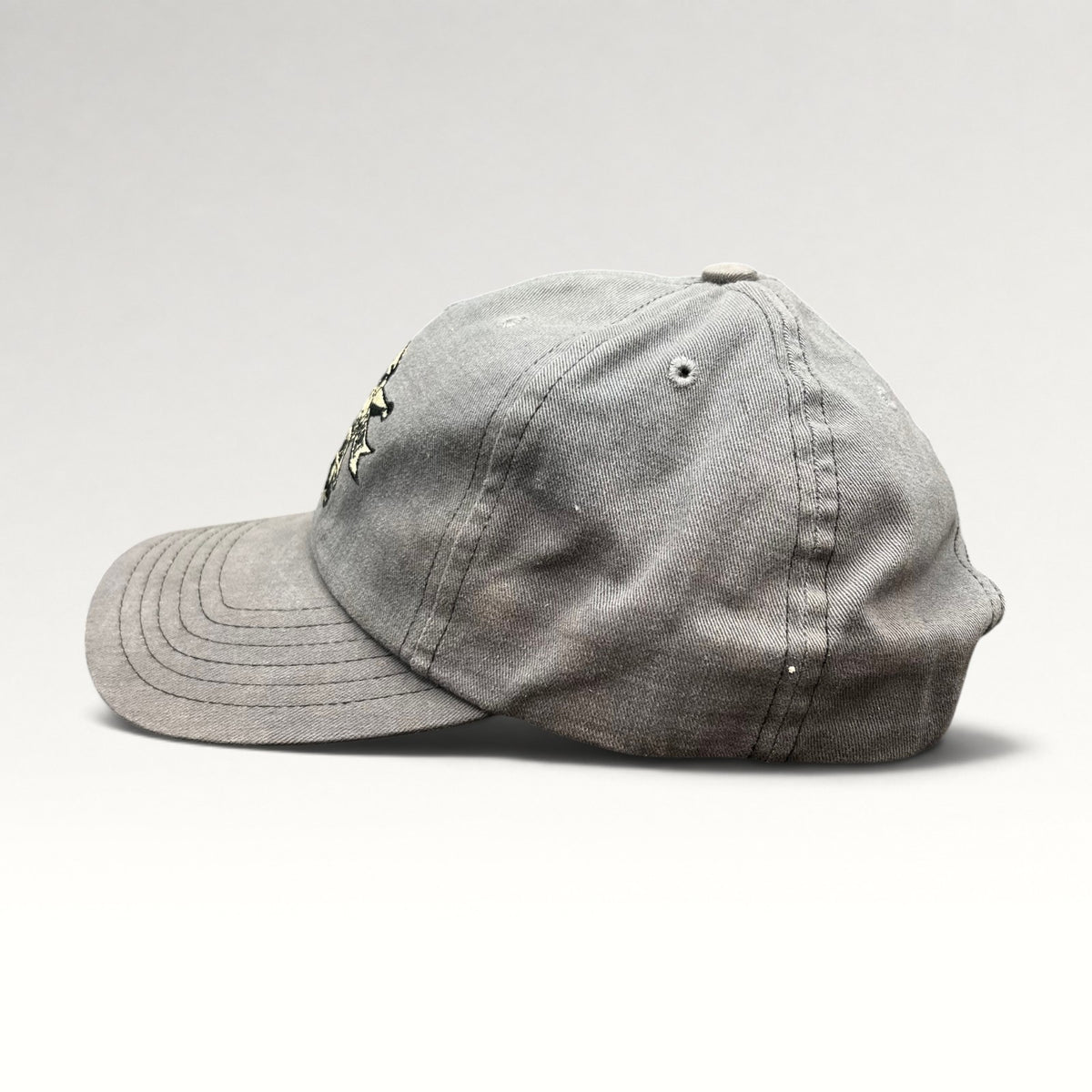 Left side view of gray North Shore Underground snapback hat