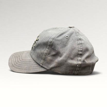 Left side view of gray North Shore Underground snapback hat