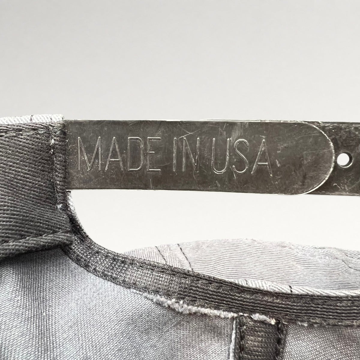 Close-up of Made in USA marking on snapback closure